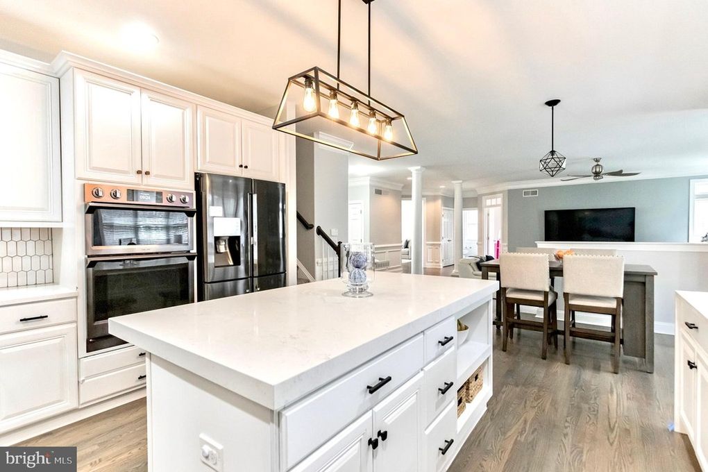 Beautifully renovated modern kitchen and living space by McCann’s Makeovers
