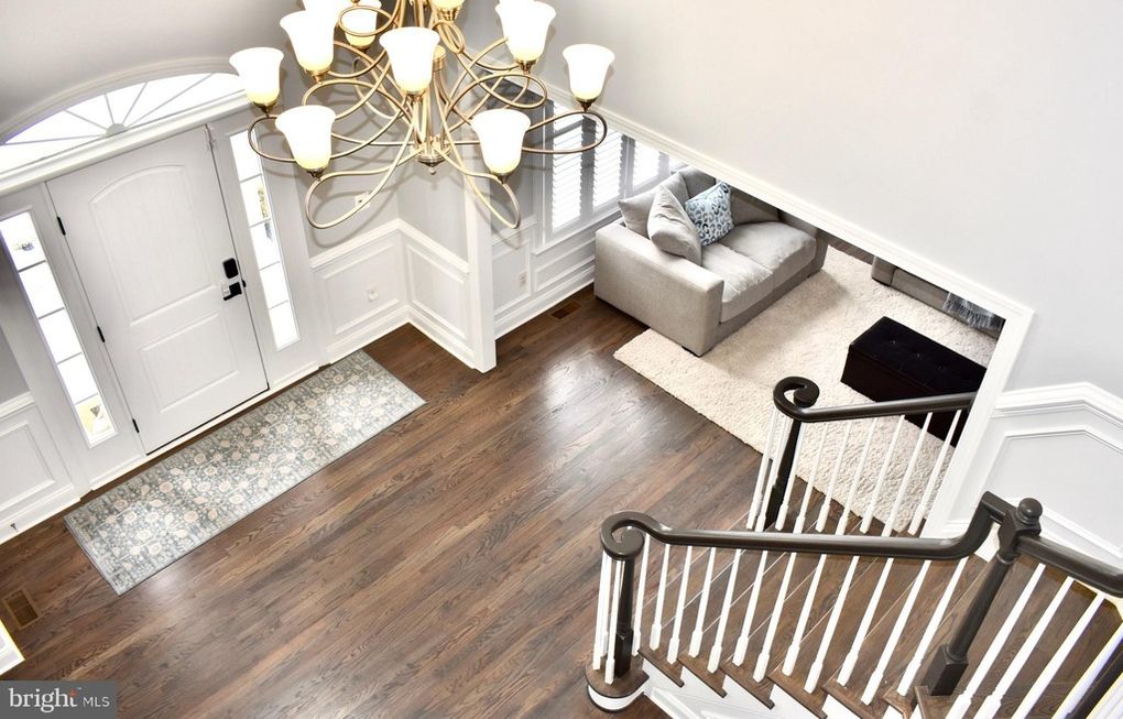 Finished entryway with hardwood floors.